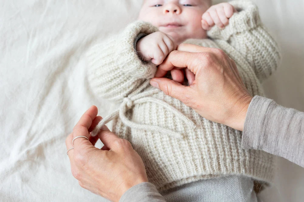 Halfen Schlüttli   –   Wickeljacke   aus   Alpaka