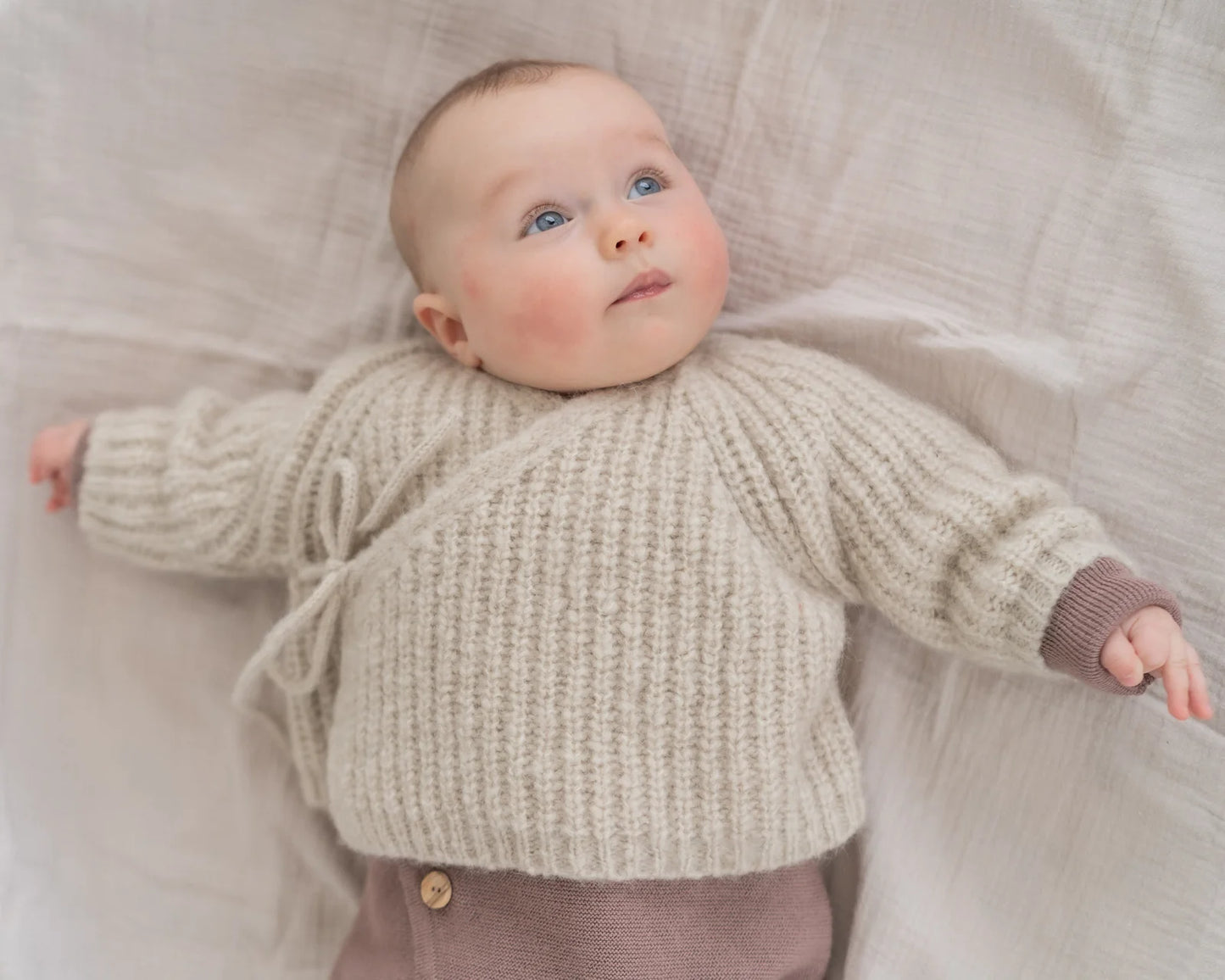 Halfen Schlüttli   –   Wickeljacke   aus   Alpaka