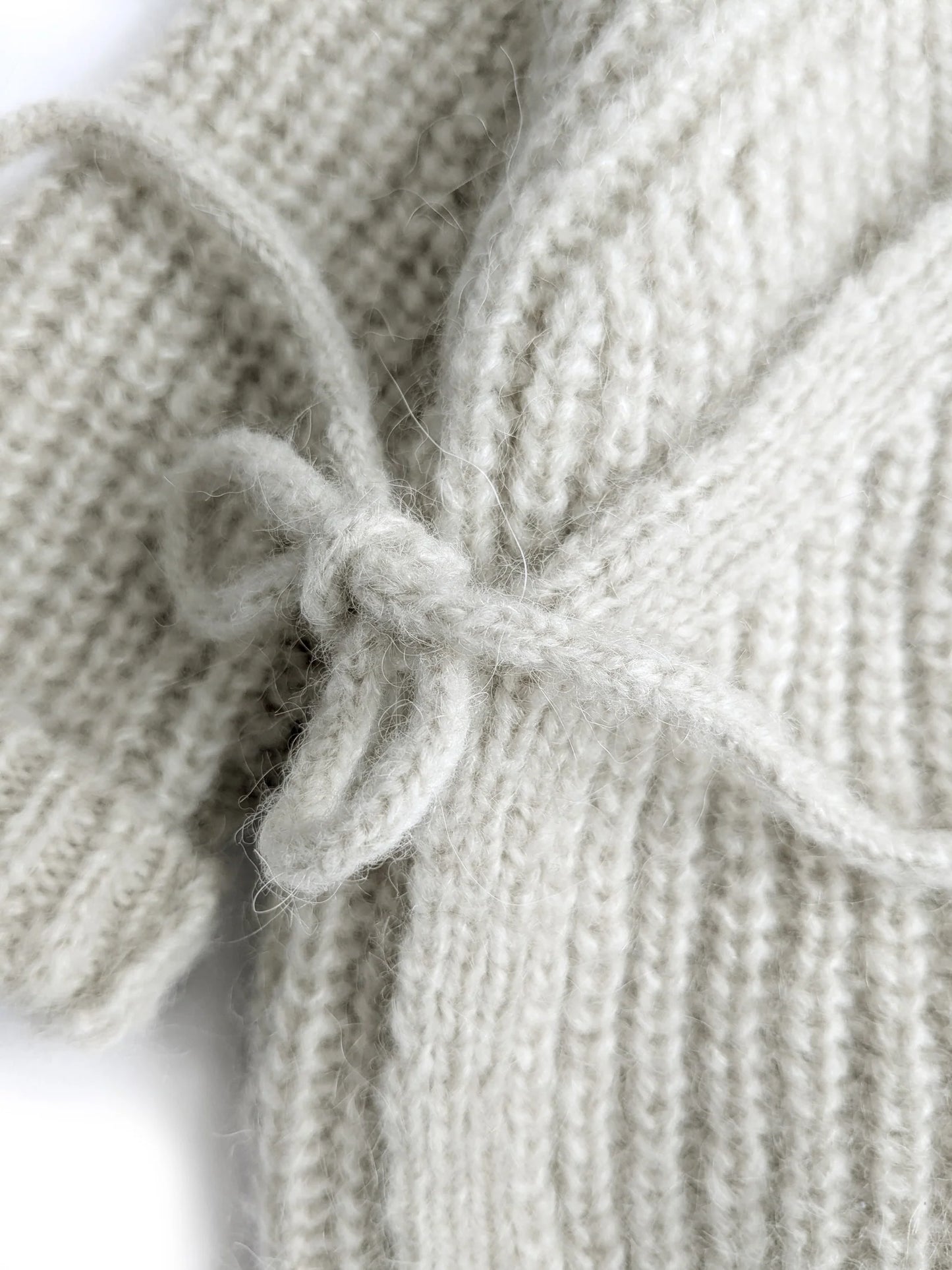 Halfen Schlüttli   –   Wickeljacke   aus   Alpaka