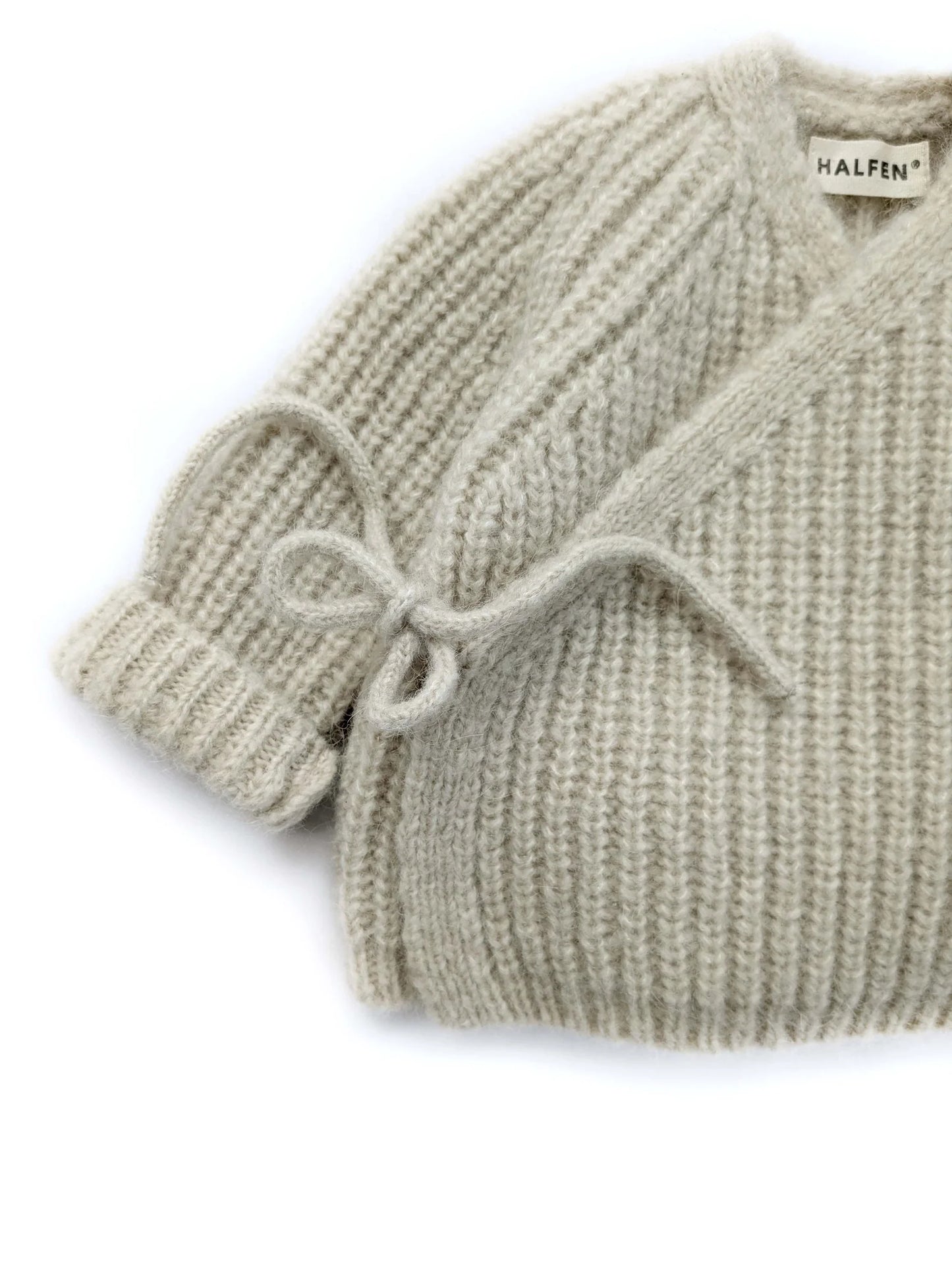 Halfen Schlüttli   –   Wickeljacke   aus   Alpaka